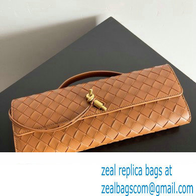 Bottega Veneta Long Clutch Andiamo With Handle Intrecciato leather bag Cognac with metallic knot closure 2024