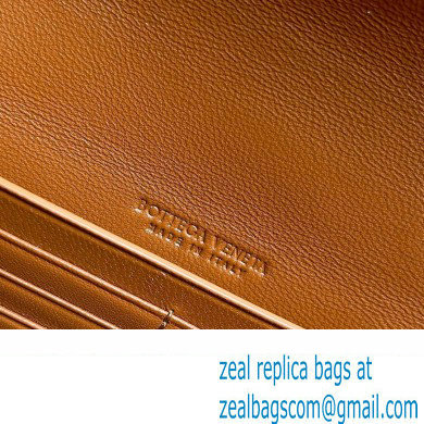 Bottega Veneta Long Clutch Andiamo With Handle Intrecciato leather bag Cognac with metallic knot closure 2024