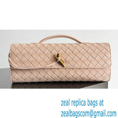 Bottega Veneta Long Clutch Andiamo With Handle Intrecciato leather bag Nude Pink with metallic knot closure 2024