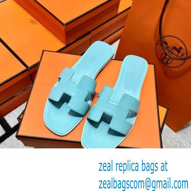 Hermes Oran Flat slippers in swift leather bleu cameo