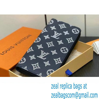 Louis Vuitton Monogram Shadow calfskin leather Zippy Vertical Wallet M83381 Ink Blue/White 2024