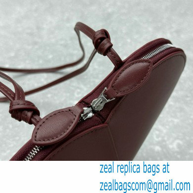 Alaia Le Coeur Heart Bag in calfskin burgundy 2024