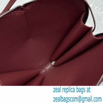 Alaia Le Coeur Heart Bag in calfskin burgundy 2024