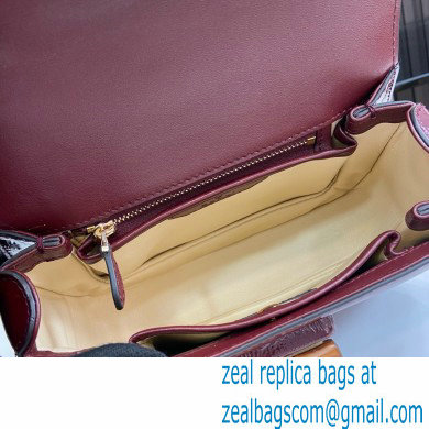 Gucci Bamboo 1947 small top handle bag in patent leather burgundy 2024