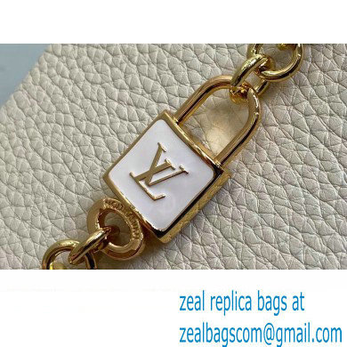 Louis Vuitton Lovelock chain Taurillon leather Capucines MM Bag Creamy 2024