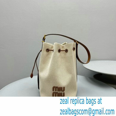 MIU MIU Canvas and leather bucket bag 5BE089 2024