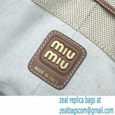 MIU MIU Canvas and leather bucket bag 5BE089 2024