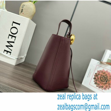 loewe mini Pebble Bucket bag in mellow calfskin dark burgundy 2024